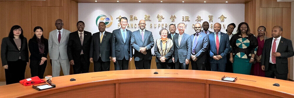 A delegation led by Dr. Phil Mnisi, Governor of the Central Bank of Eswatini, pays a visit to the FSC.